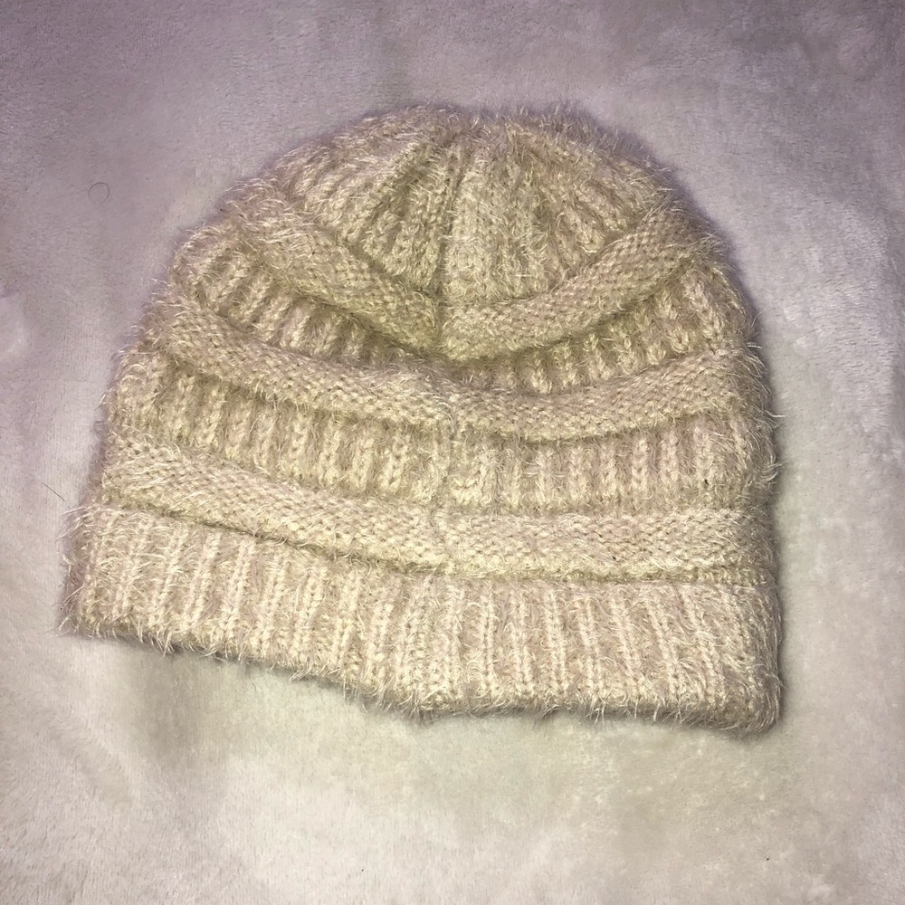 Cream hat, super soft. Barely used